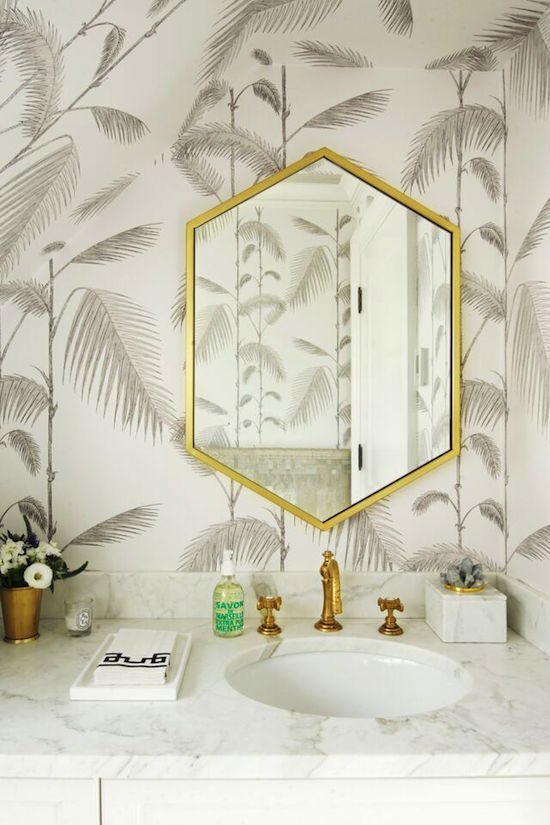 renovation reveal of palm print wallpaper guest bathoom