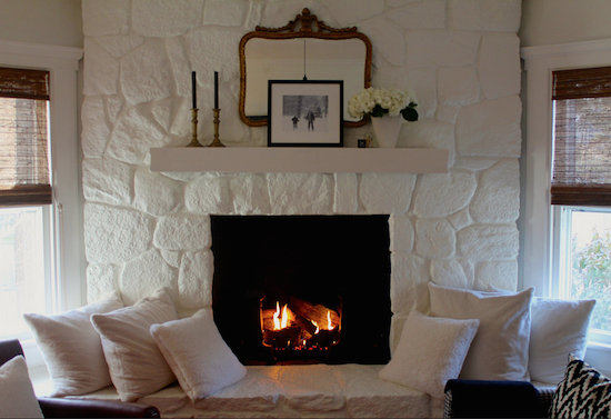 white painted stone fireplace