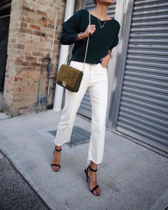 WOMEN ON STREET IN WHITE JEANS AND HEELS