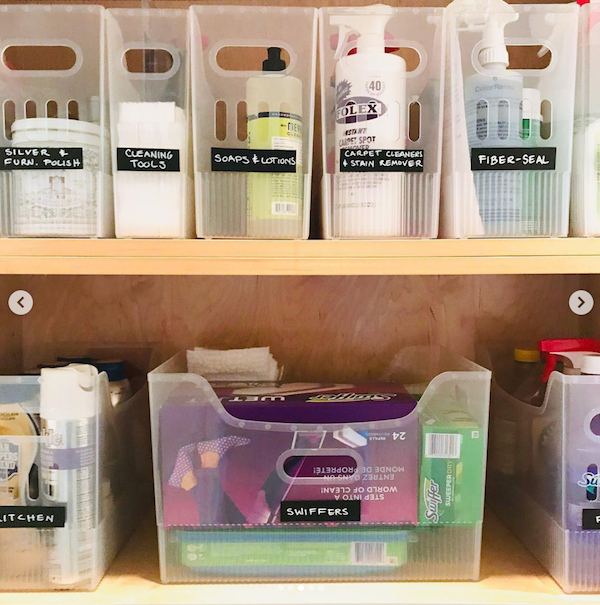 inside laundry room cabinet, organized cleaning products