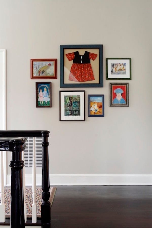 home decorating idea on a budget, family heirlooms framed and hung on the wall 