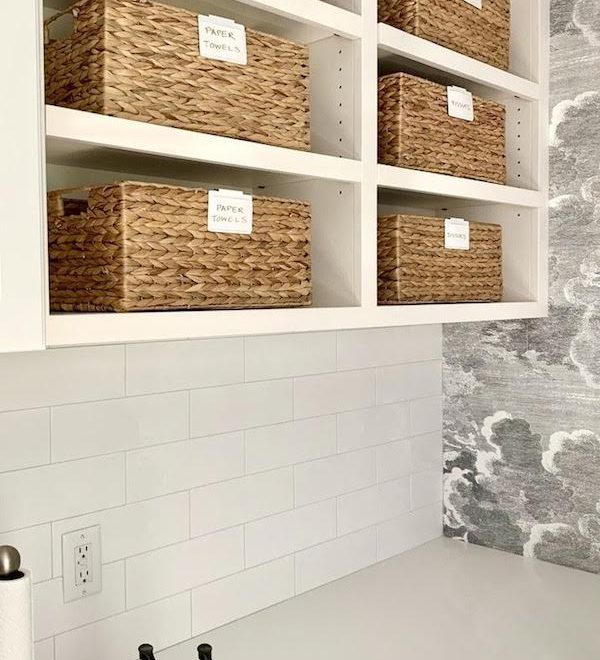 organized shelves in a laundry room.