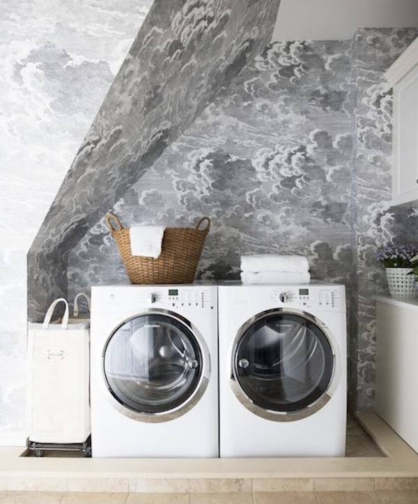 laundry room with cloud wallpaper.