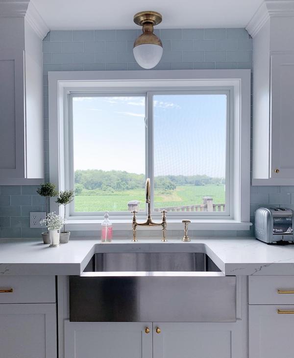 mix metal in kitchen light and sink.