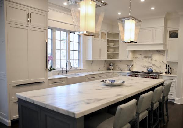 modern white kitchen with cabinets painted Benjamin Moore decorators white