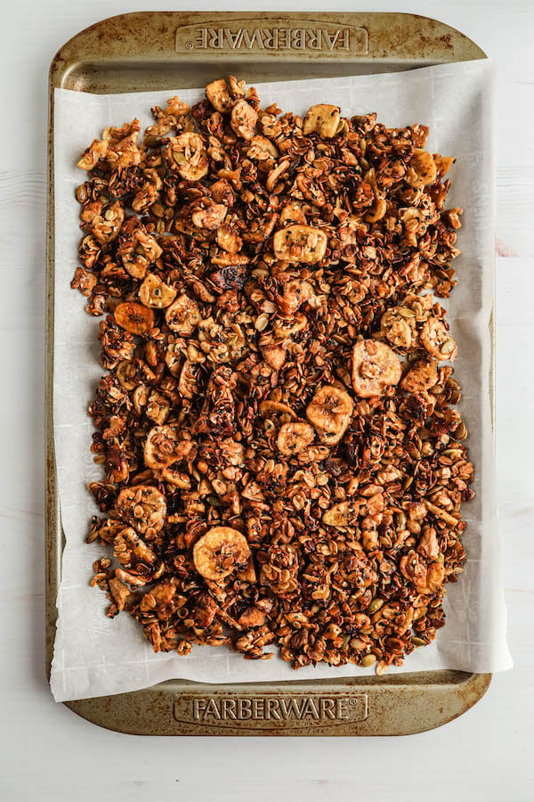 Banana Bread Granola fresh from the oven on a baking tray