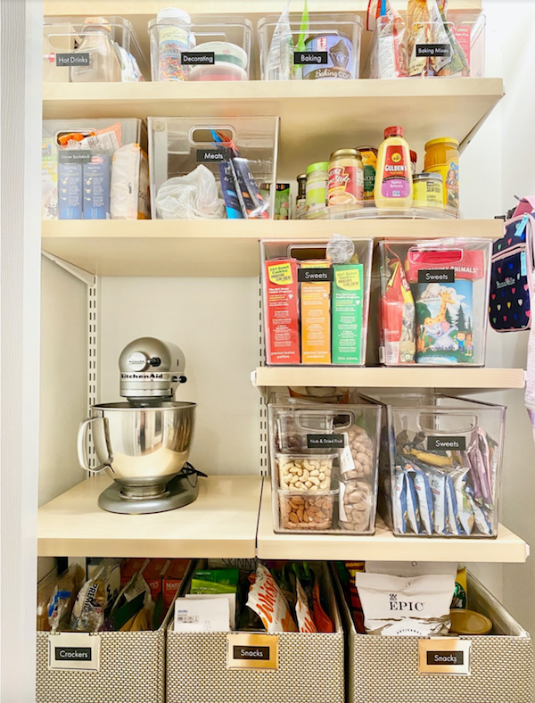 Pantry shelves with labeled categories