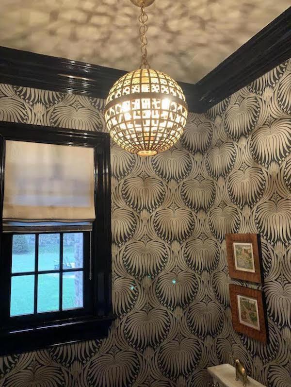 powder room with black painted molding and trim