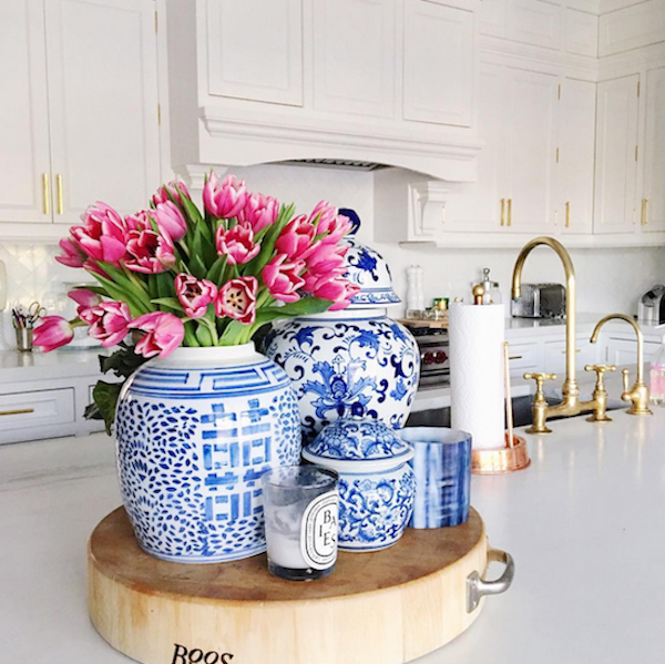 pink tulips in blue and white ginger jar