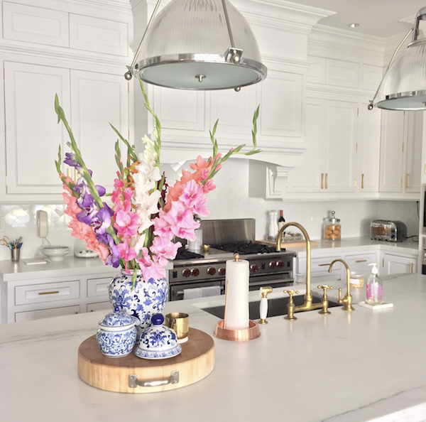 fresh flowers during the summer displayed on kitchen center island