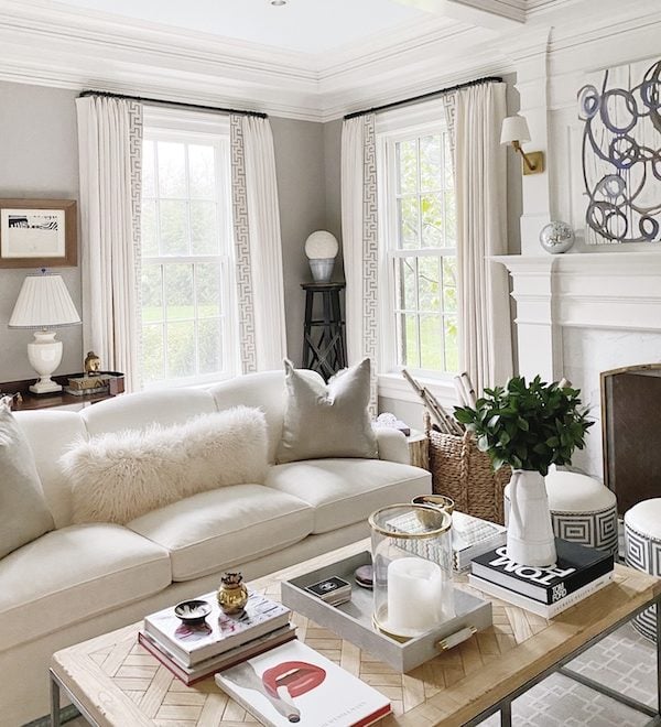 living room corner with painted gray beige walls