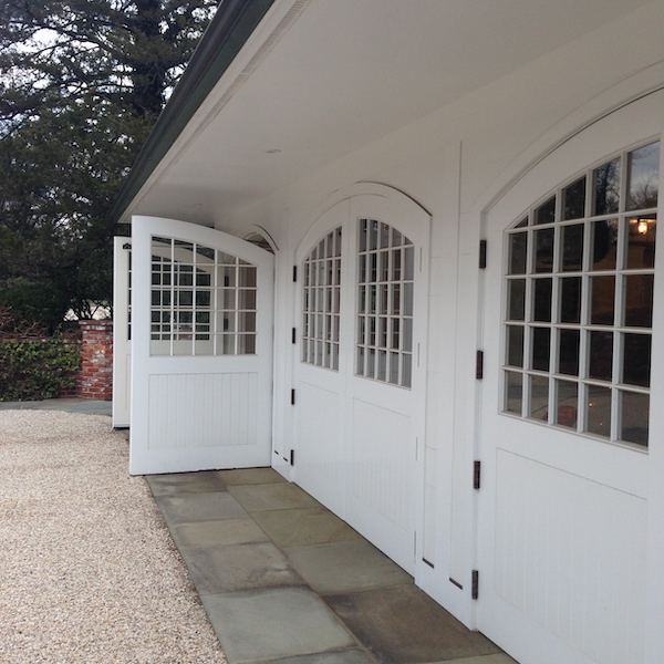 three bay garage in white home