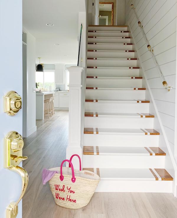 white stairs in beach house renovation.