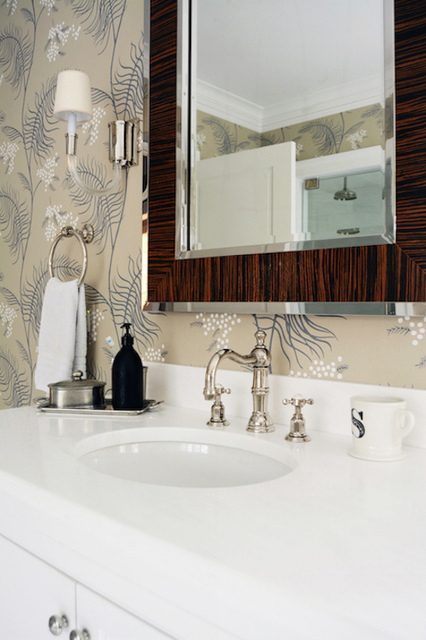 white sink and dolomite counter on bathroom vanity