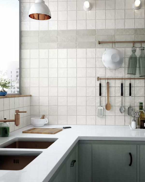 white square ceramic tiles on kitchen backsplash.
