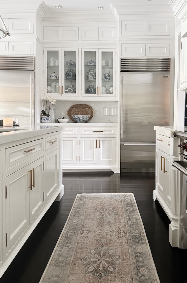 white kitchen with runner.