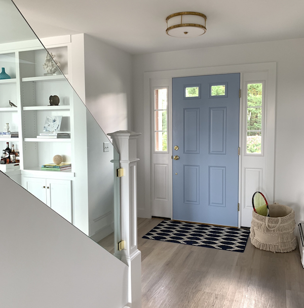 light wood floors with white walls in beach house.