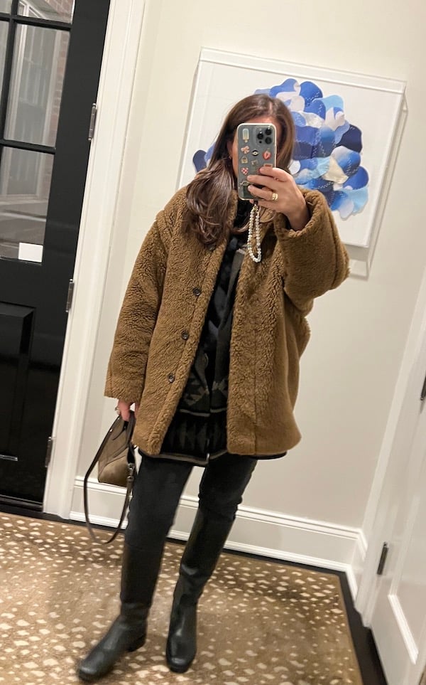 selfie of woman in warm winter coat.