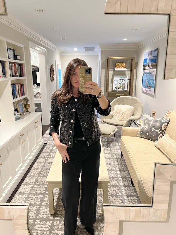 woman wearing sparkly holiday party outfit.