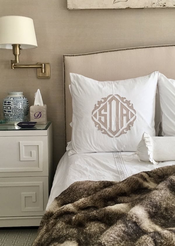cozy faux fur on primary bedroom bed styling idea.