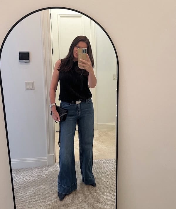 real outfit example of wide leg jeans over 50.