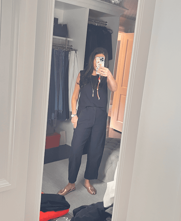 50 plus woman in all black cute casual outfit.