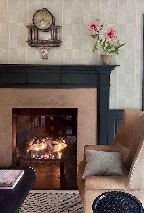 paper flowers on fireplace mantel mayflower inn.