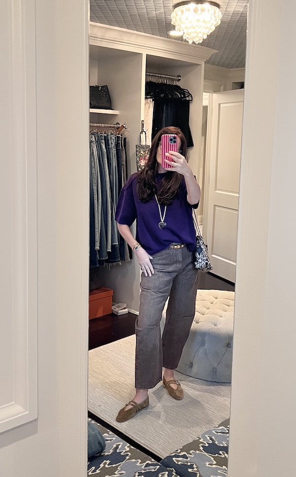 purple sweater for fall with brown jeans and brown suede flats.
